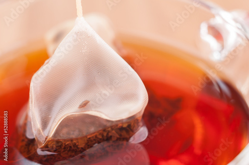 Silky pyramid mesh teabag in a cup extreme close up photo