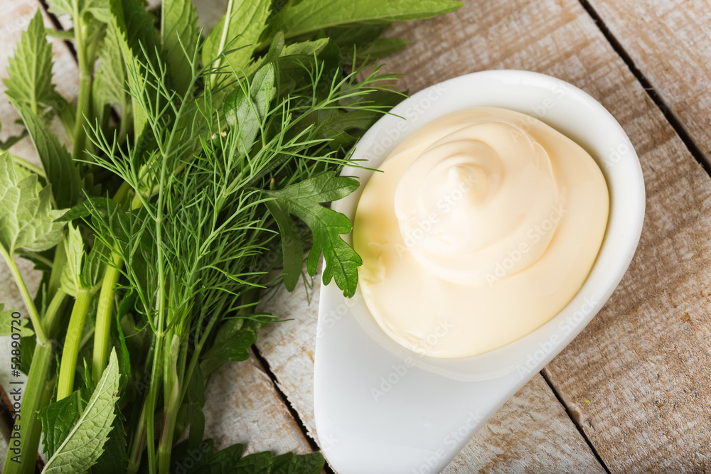 Mayonnaise in bowl on table Mayonnaise in bowl on table