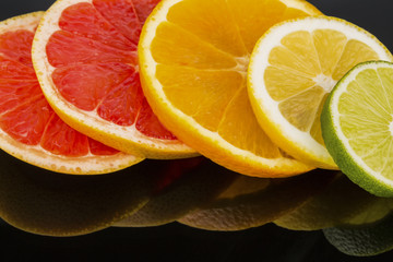 Keuken achterwand Plakjes fruit Sinaasappelplakjes oranje citrusvrucht  © Gina Sanders