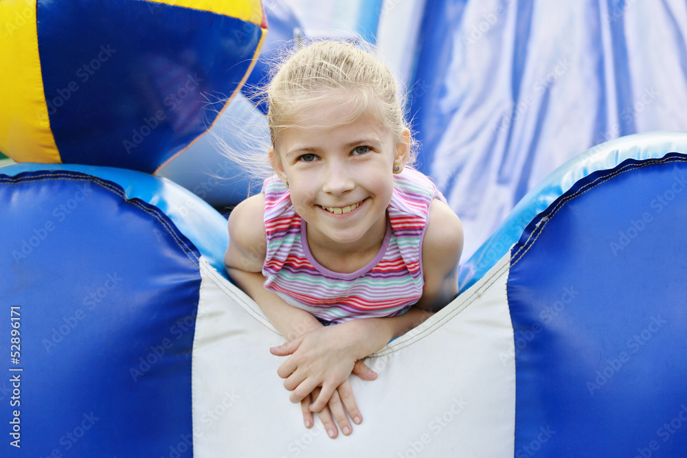 Delighted girl on roller coaster
