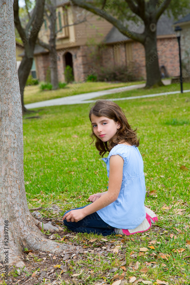 beautiful kid girl smiling sitting on park lawn relaxed beautiful kid girl smiling sitting on park lawn relaxed