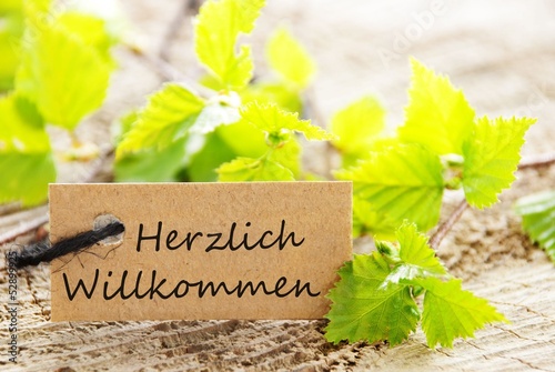 label with Herzlich Willkommen