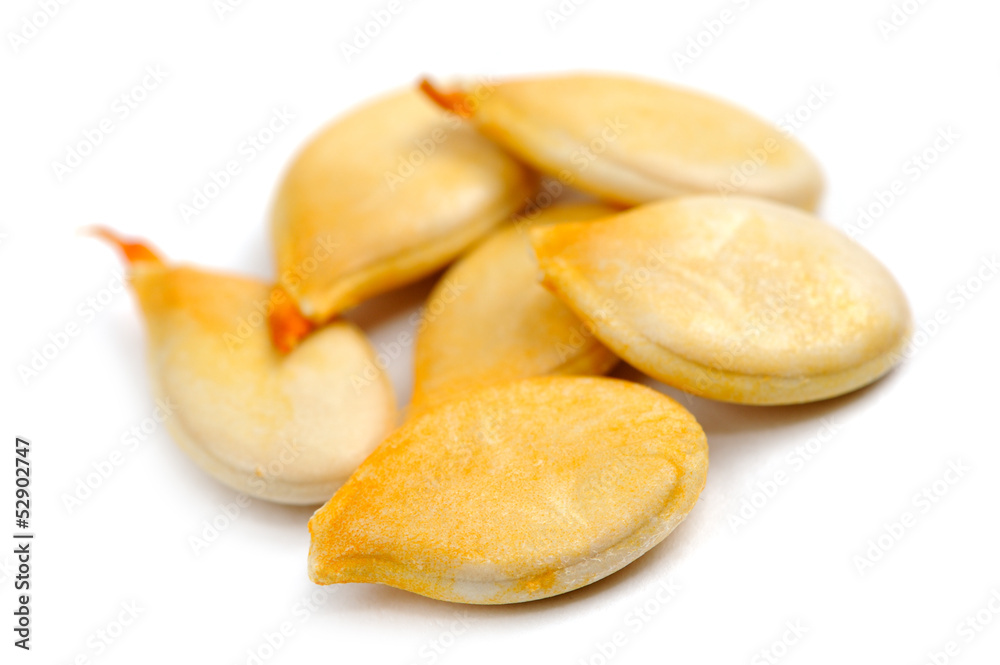 Pumpkin Seeds (Pepitas) Macro Isolated on White Background Pumpkin Seeds (Pepitas) Macro Isolated on White Background