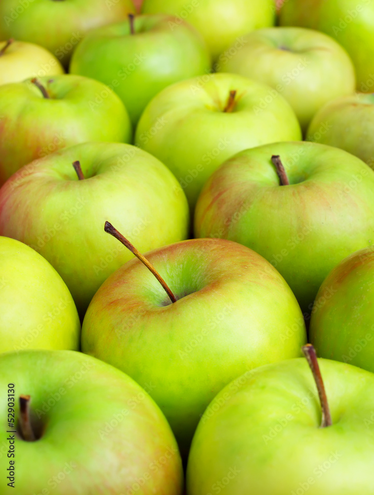Green apple as a background. Healty and tasty food Green apple as a background. Healty and tasty food