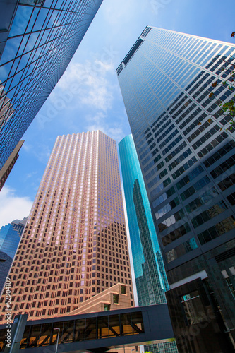 Houston downtown skyscrapers disctict blue sky mirror