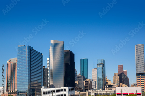 Houston downtown skyscrappers skyline on blue sky © lunamarina