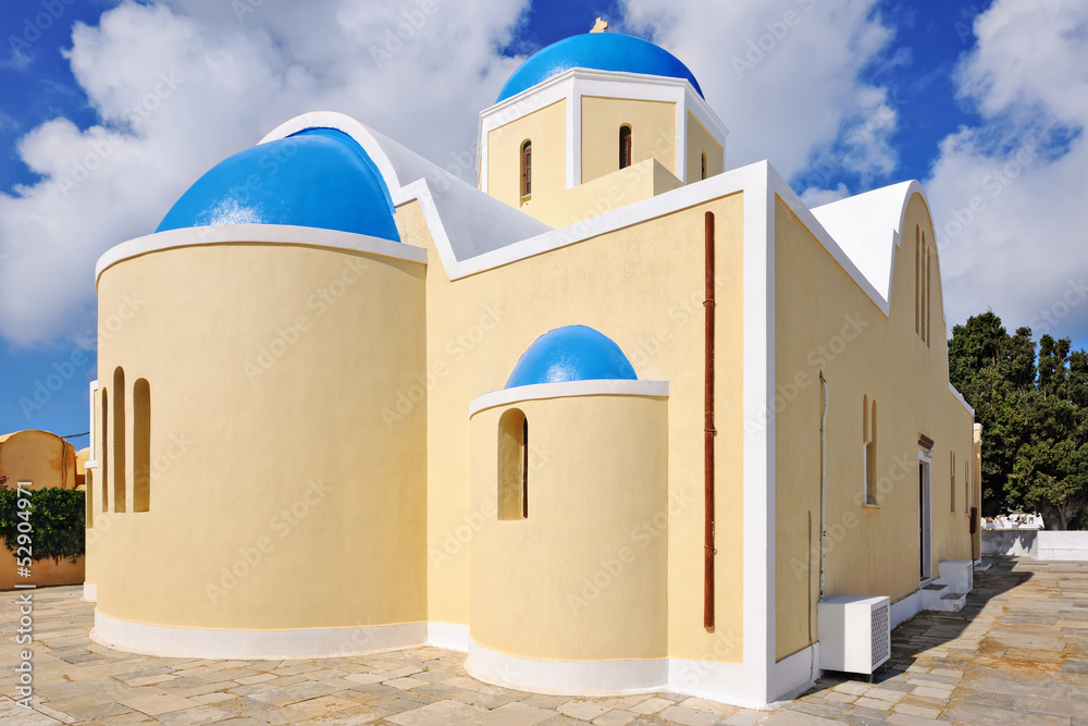 Blue dome orthodox church in Oia