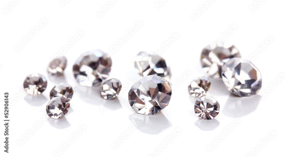 Beautiful shining crystals (diamonds), isolated on white Beautiful shining crystals (diamonds), isolated on white