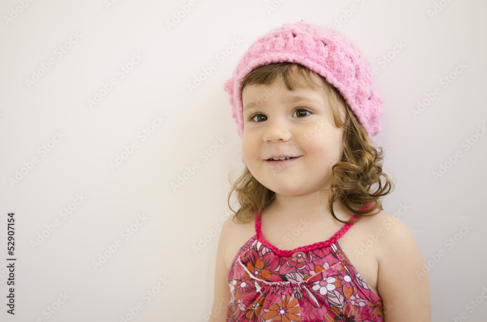 portrait of little girl with pink handmade cap portrait of little girl with pink handmade cap