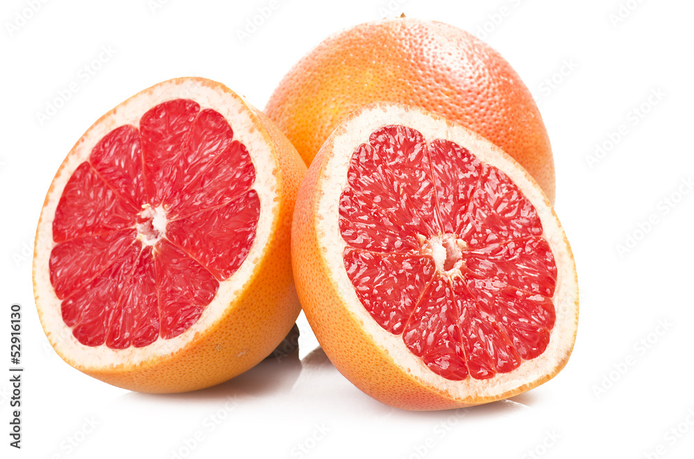 Pink grapefruit close up on the white Pink grapefruit close up on the white