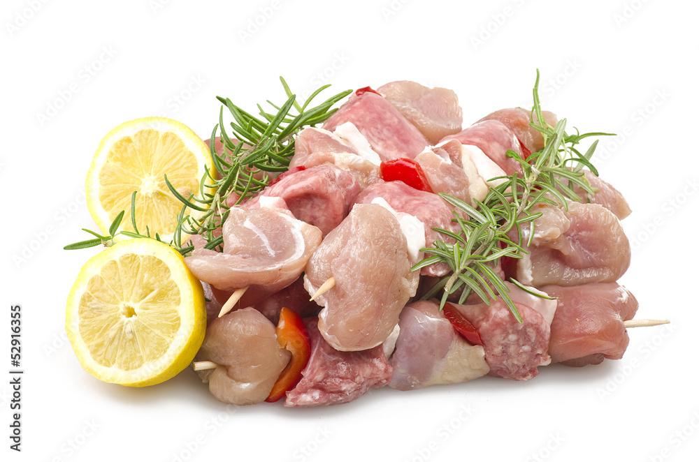 chicken skewers and rosemary close up on white chicken skewers and rosemary close up on white