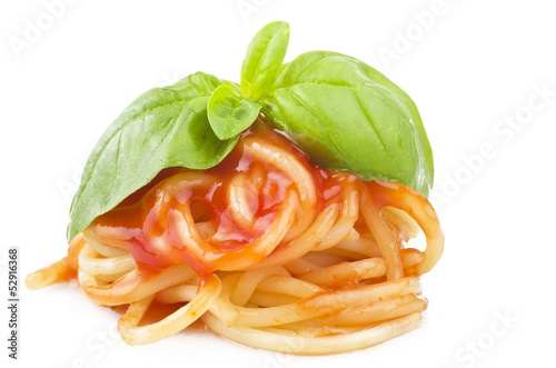 fork with spaghetti sauce and basil on white