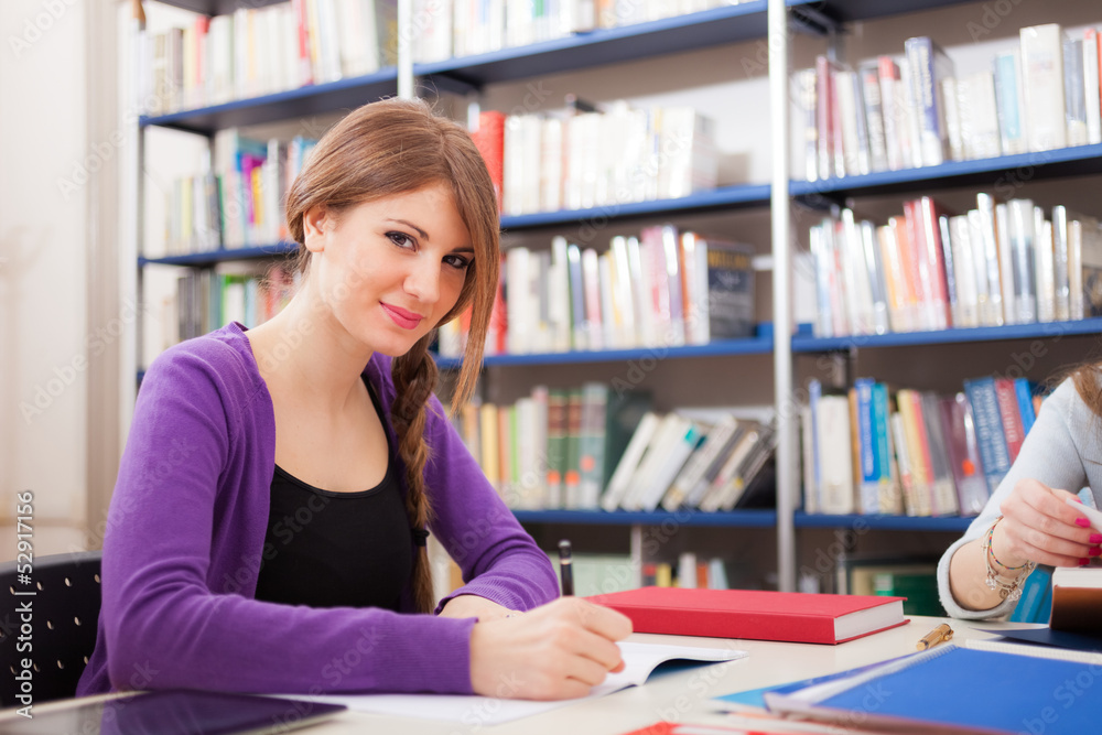 Portrait of a student in a library Portrait of a student in a library