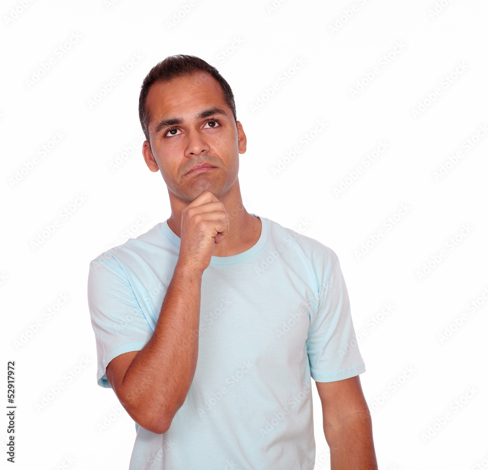 Charming pensive young man looking up Charming pensive young man looking up