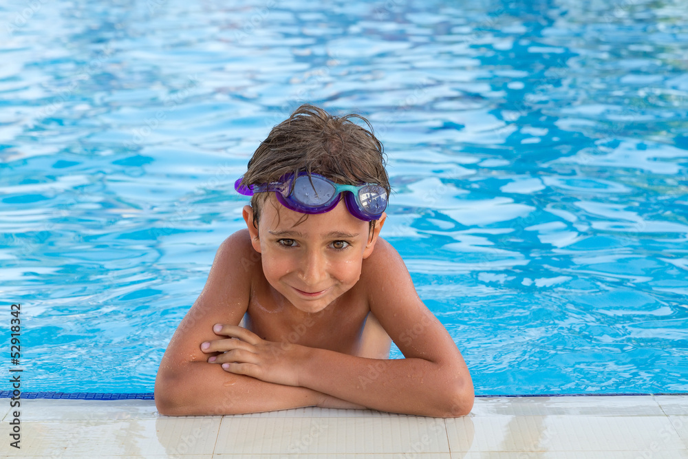 Portrait of the boy in the pool