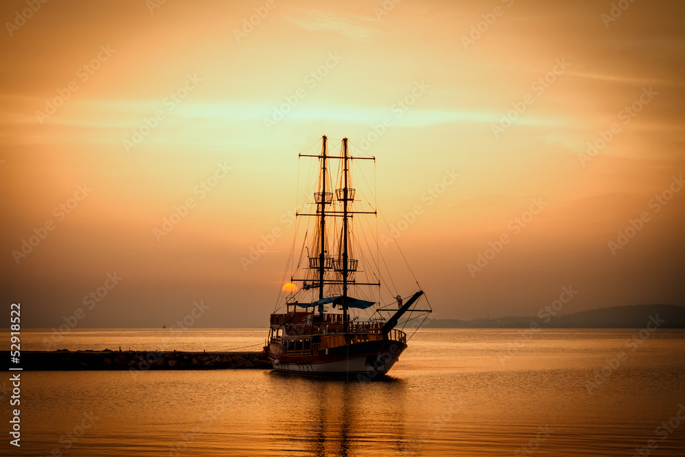 Ship silhouette at sunset