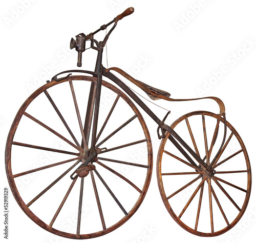 Old wooden bicycle with pedals used 70 years of the 19th century photo
