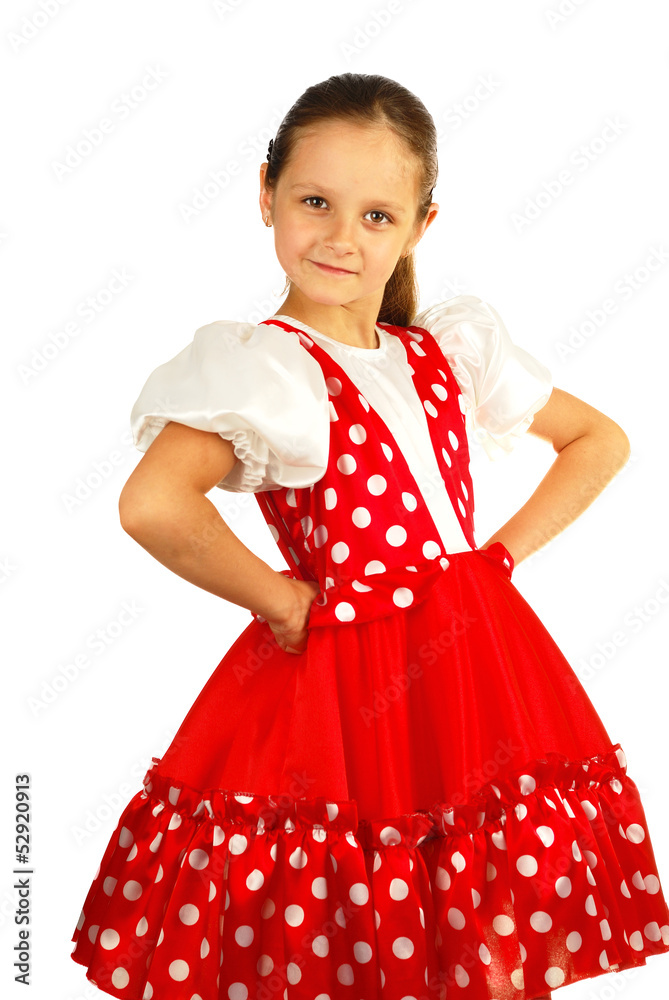 The child dances in Russian dance costume