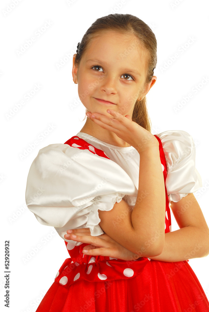 The child dances in Russian dance costume