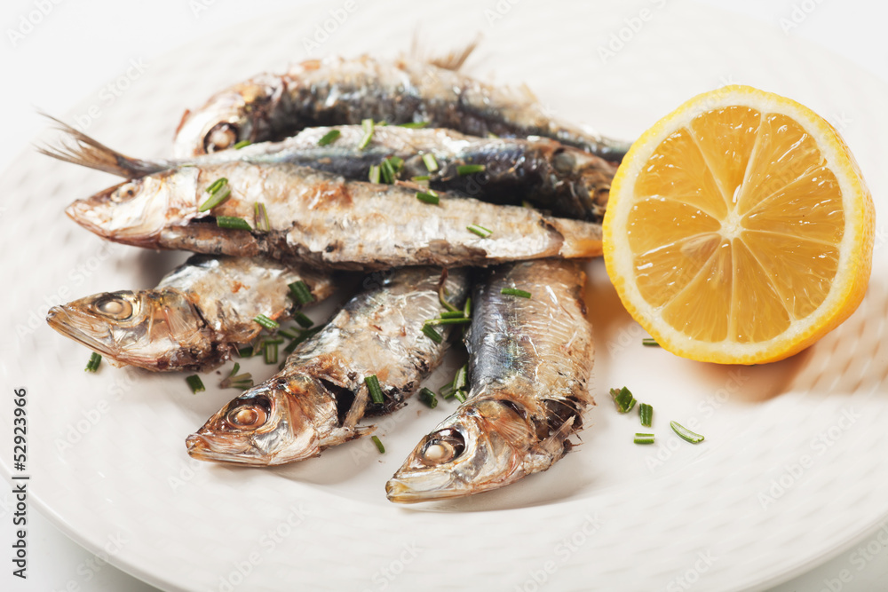 Grilled sardine fish with lemon and herbs Grilled sardine fish with lemon and herbs