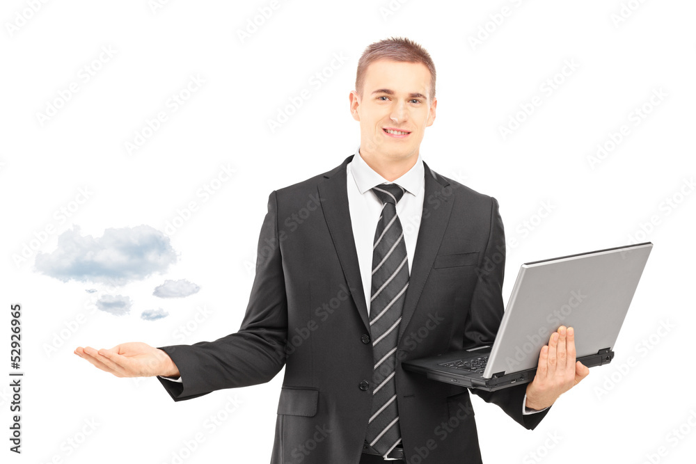 Man in a suit holding a laptop and gersturing with his hand symb Man in a suit holding a laptop and gersturing with his hand symb