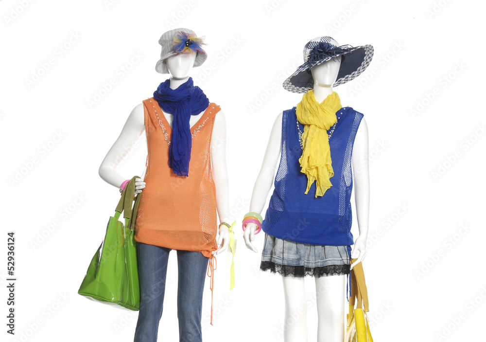 fashion dress with handbag and scarf on female on two mannequin