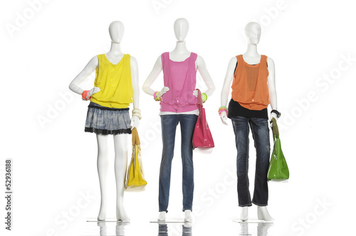fashion dress with handbag on female three mannequin