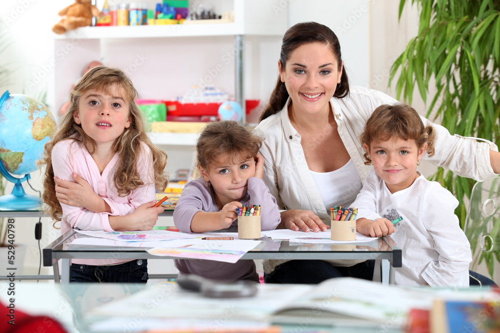 three primary schoolgirls and a teacher three primary schoolgirls and a teacher
