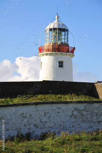 White Lighthouse in Ireland photo