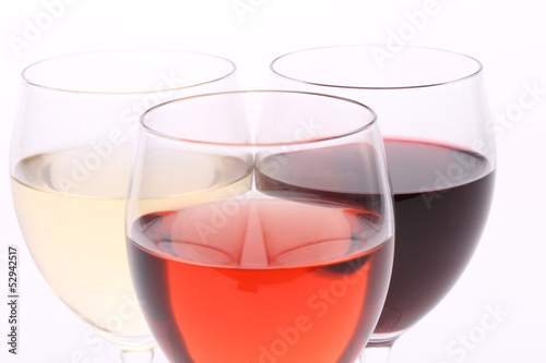 three glasses with white, rose and red wine