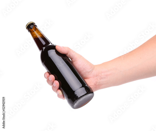 A bottle of beer in a hand