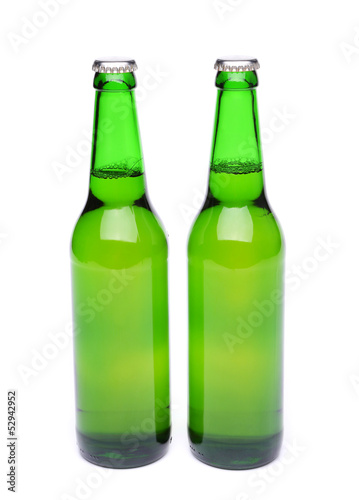 Two bottles of light ale on white background.