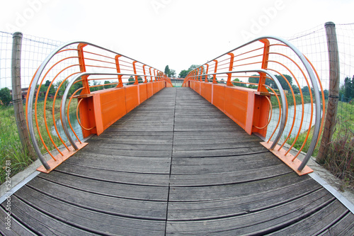 pedestrian cycle bridge to cross the River with fish eye view photo