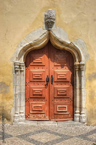 Portal lateral da igreja de S. João Batista photo