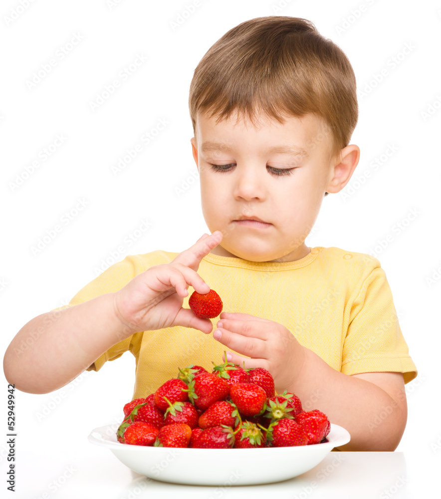 Little boy with strawberries Little boy with strawberries