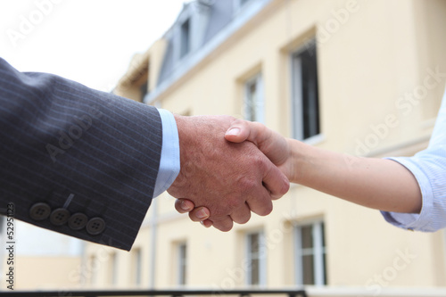 Man and woman shaking-hands