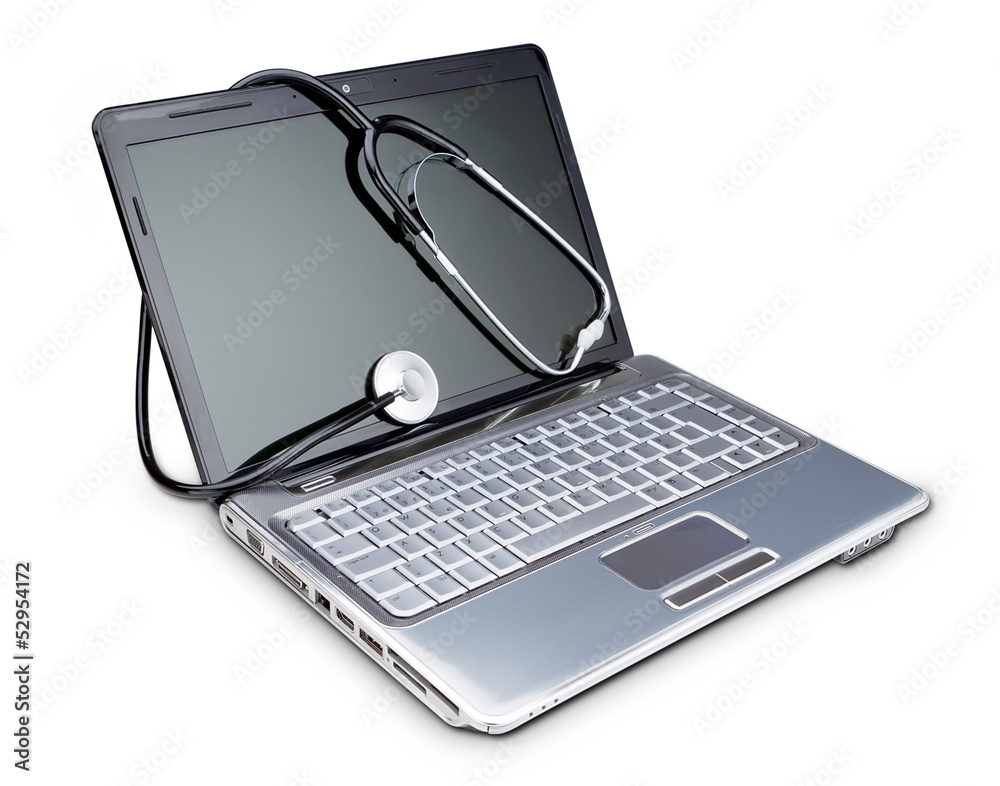 Stethoscope on a modern laptop to diagnose. On a white backgroun Stethoscope on a modern laptop to diagnose. On a white backgroun