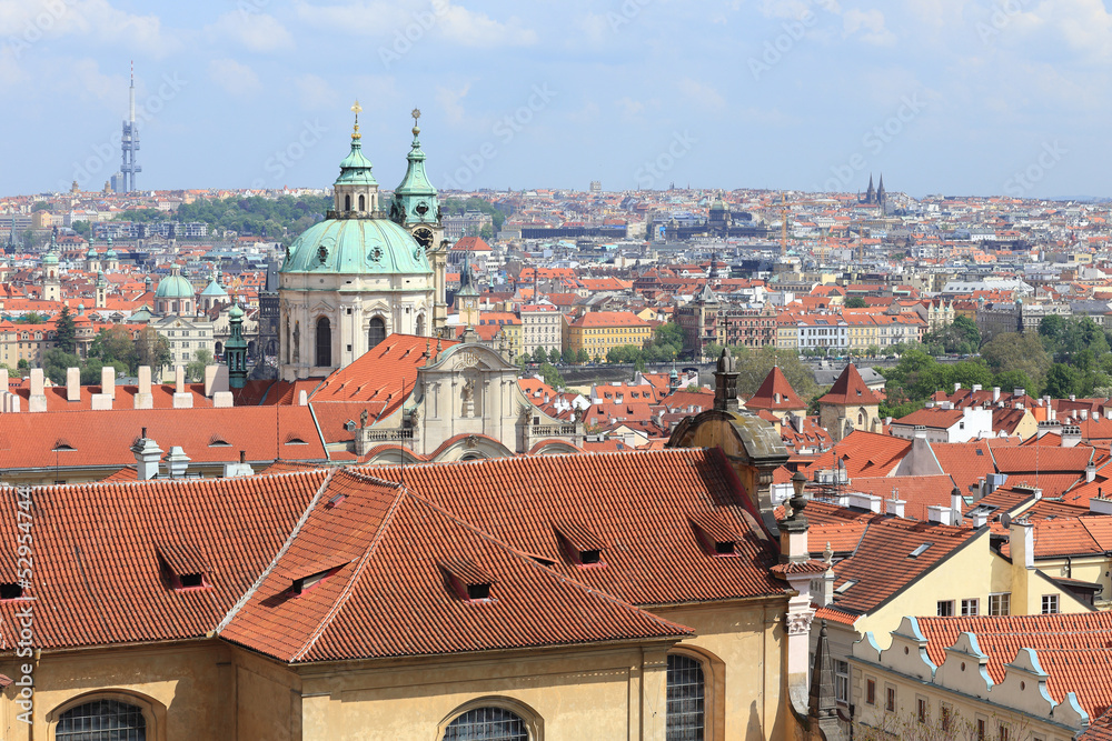 Fototapeta premium Spring Prague with St. Nicholas' Cathedral, Czech Republic