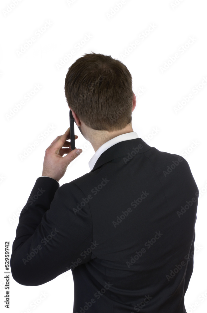 Anonymer Geschaeftsmann / Rueckenansicht telefoniert Anonymer Geschaeftsmann / Rueckenansicht telefoniert