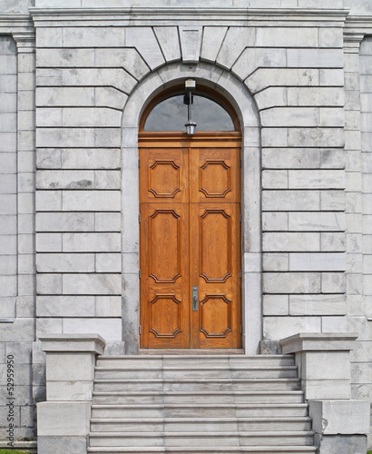 steps leading to wooden double doors