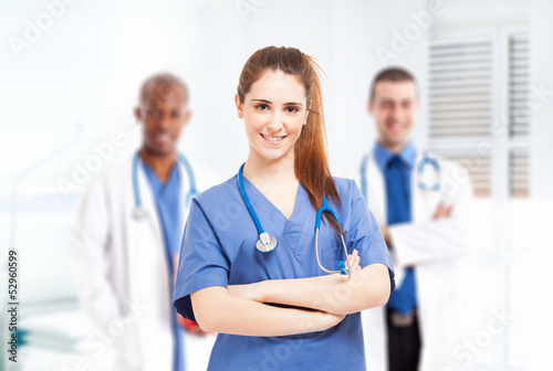 Nurse in front of her medical team