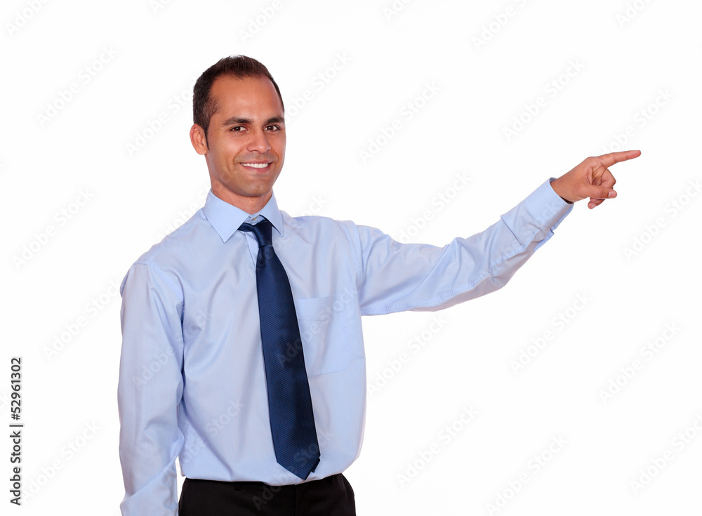 Attractive latin man pointing to his left Attractive latin man pointing to his left