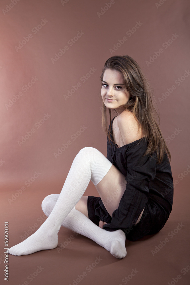 Beautiful girl on brown background