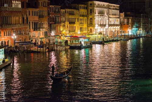 Gondolas on Grand Canal at night © Nejron Photo
