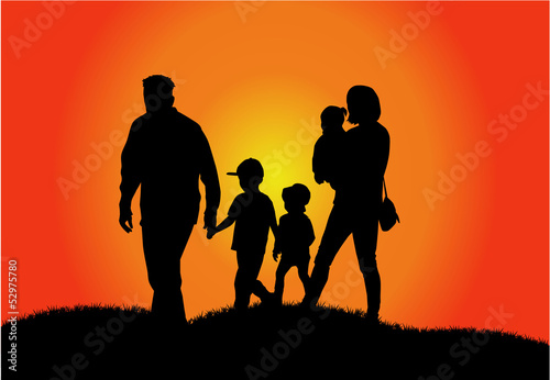 happy family and a beautiful sunset