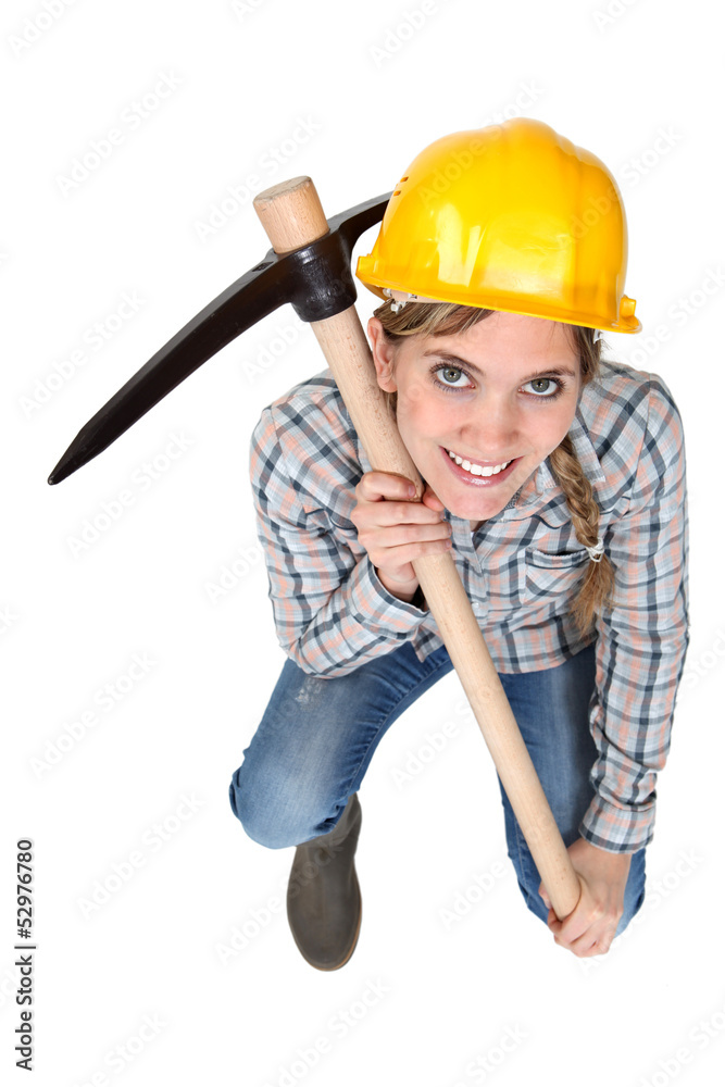 Craftswoman holding a pick Craftswoman holding a pick