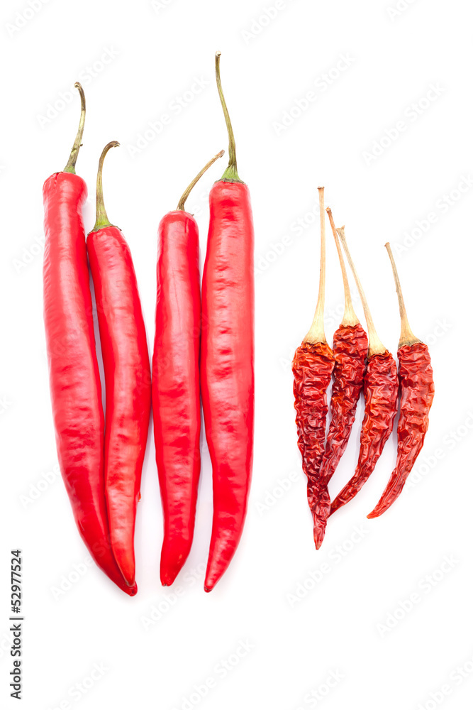 Red chili peppers isolated on the white Red chili peppers isolated on the white