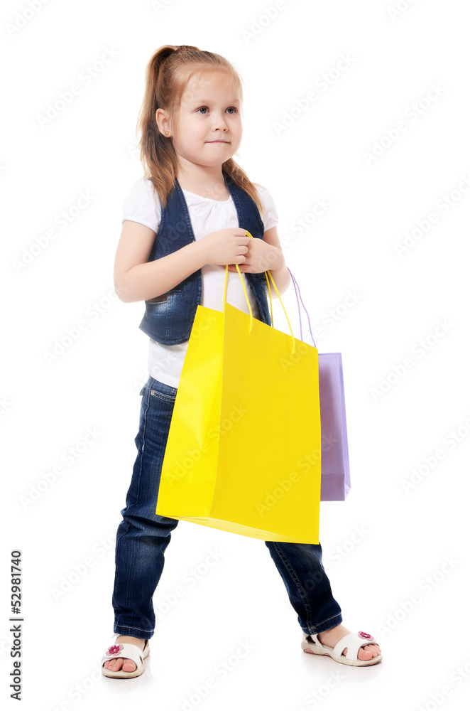 The little girl with two packages isolated