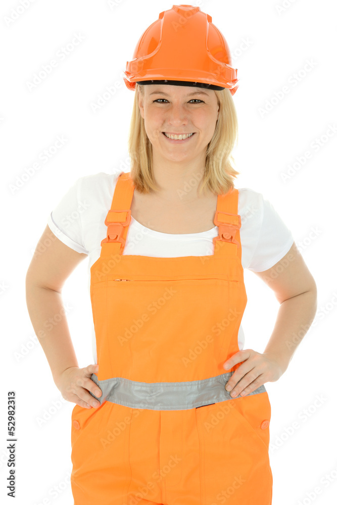 Freundliche Bauarbeiterin mit Schutzhelm Freundliche Bauarbeiterin mit Schutzhelm