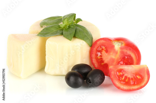Cheese mozzarella,basil and vegetables isolated on white